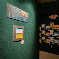 Room with sign Poetic Landscapes Student Art Show